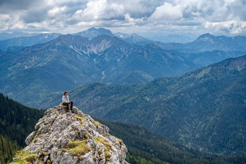 Mountaineer at the summit of Taubenstein