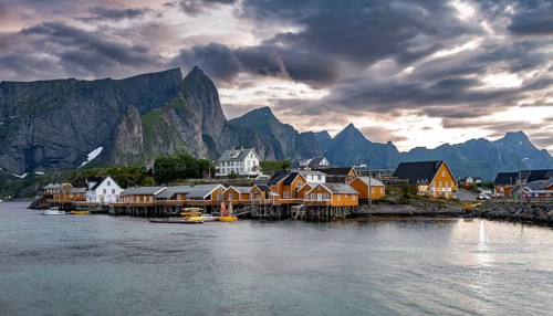 Traditional yellow rorbuer cabins on Sakrisoya Island