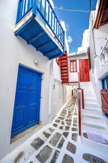 Cycladic white houses with colourful doors and shutters