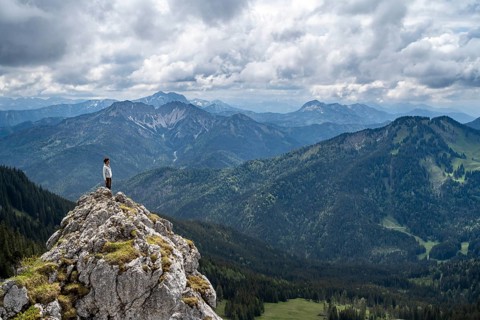 Mountaineer at the summit of Taubenstein