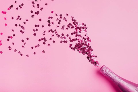 Pink bottle champagne with star form glitter