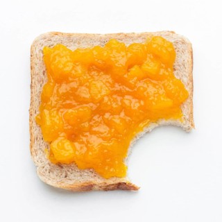 Top view apricots jam bread