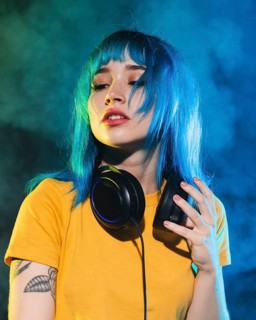 Low angle female dj club