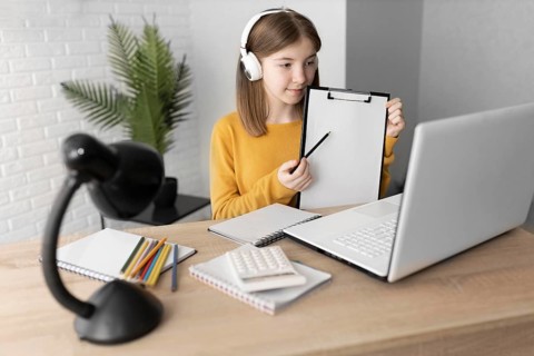 Medium shot girl holding clipboard