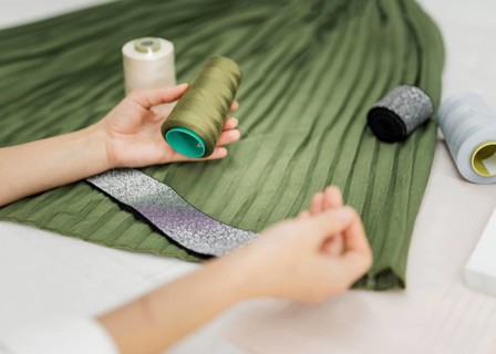 Woman sewing manual skirt