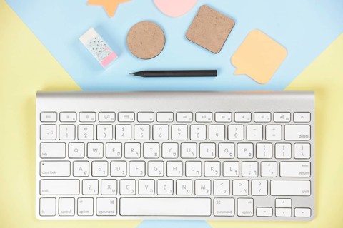 Shapes eraser pencil near white keyboard dual backdrop