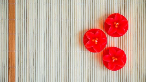 Red flower shaped candles