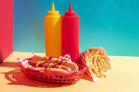 Food assortment with hot dog sauce bottles