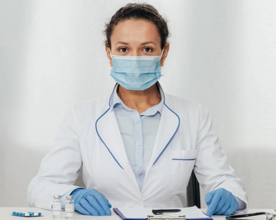 Medium shot woman wearing medical mask