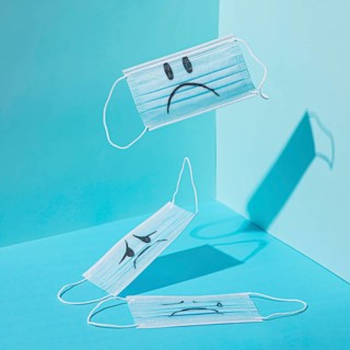 Blue monday concept with face mask