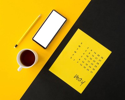 Planner calendar yellow black background with coffee