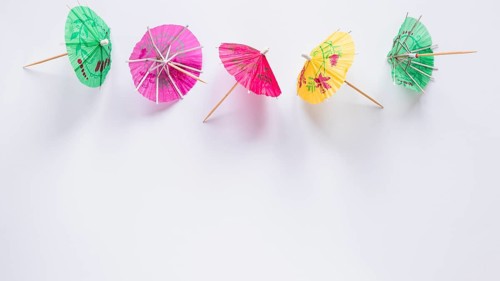 Bright cocktail umbrellas table