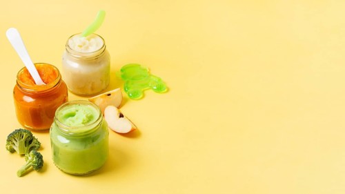 Baby food frame jars yellow background