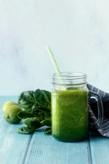 Green smoothie wooden table