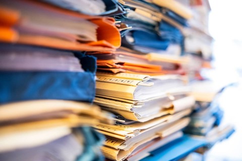 A stack of court files