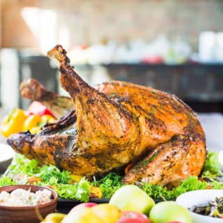 Roasted turkey with food table
