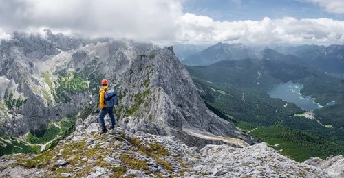 Mountaineer at the summit of the Waxenstein