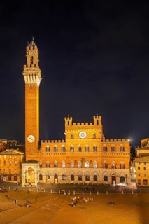 The Piazz del Campo with its bell tower Torre del Mangia and the town hall Palazzo Pubblico