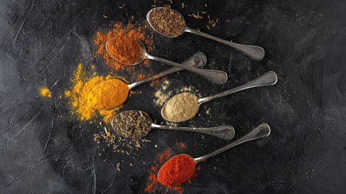 Spices arrangement spoons top view