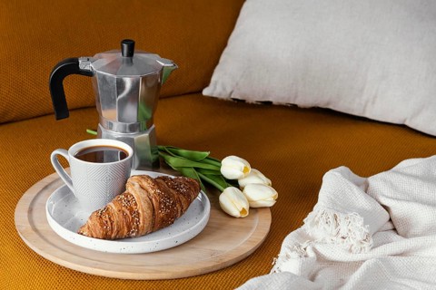 High angle croissant coffee flowers