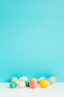 Different colored easter eggs table