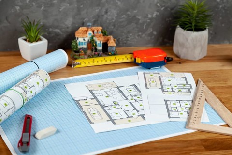 High angle architectural project desk