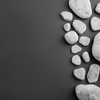 Different type spa gray stones black background