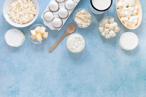Flat lay eggs cheese arrangement