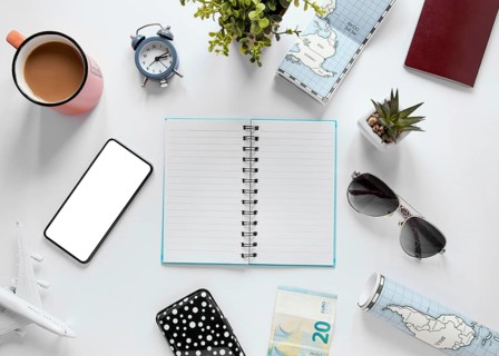 Tourism items arrangement flat lay