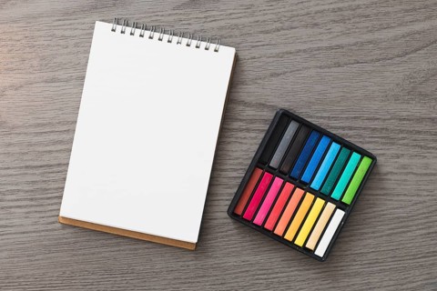 Pastel near sketchbook