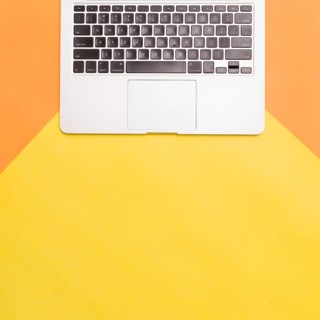 Flat lay laptop colorful background