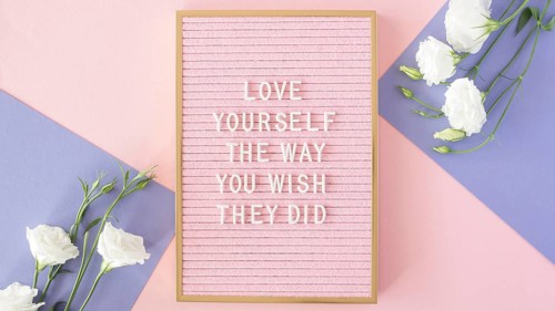Pink motivational text board view