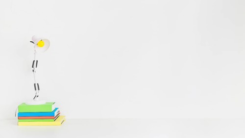 White reading lamp colorful books