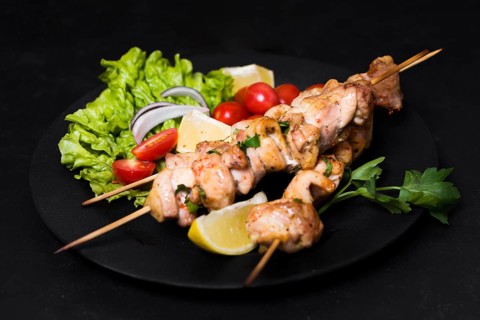 Cooked meat veggies kebab high view