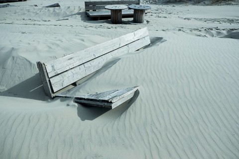 Shipped wooden furniture on the beach of West on the North Sea island of Terschelling