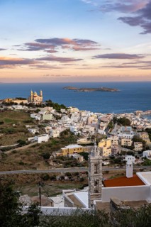 View of the town of Ermoupoli with Anastasi Church or Church of the Resurrection at sunset