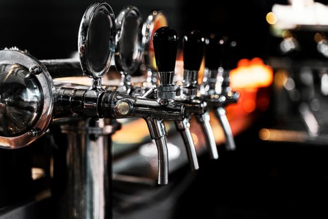 Close up beer machine pub