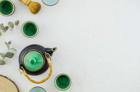 Set asian herbal tea with tea brush isolated white background
