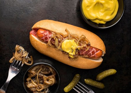 Top view hot dog with mustard