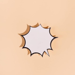White speech bubble with black border text beige background