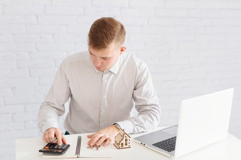 Man accounting laptop