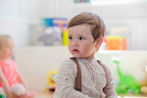Boy striped shirt looking away