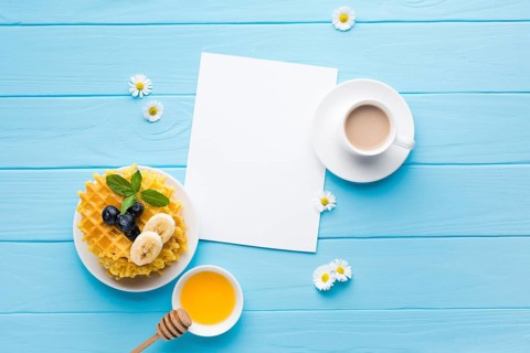 Flat lay paper card mockup breakfast table