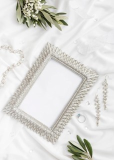 Floral ornaments beside frame