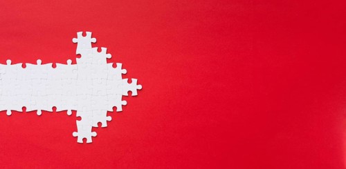 Puzzle pieces arrow with copy space