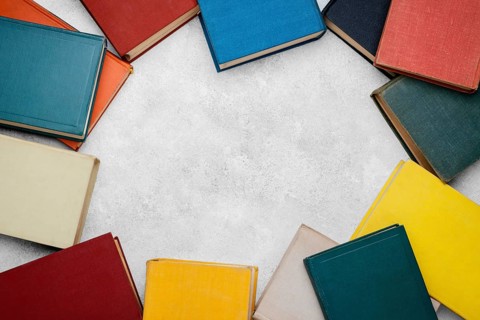 Top view books circle with copy space