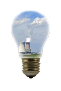 Cooling towers of nuclear power plant inside incandescent lamp