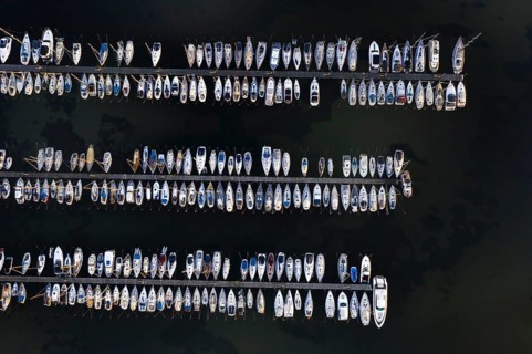 Aerial view over jetties with sailing boats at marina in harbour of Heiligenhafen along the Baltic Sea