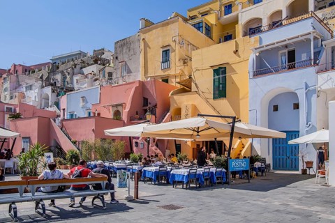Fish restaurants on the waterfront of the fishing village of Corricella