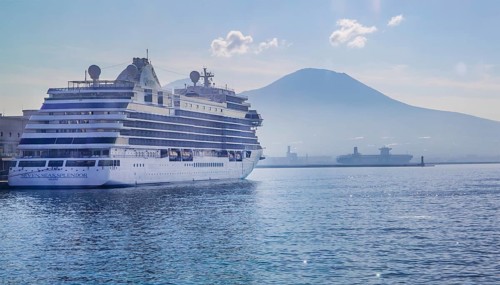 Cruise ship at Statione Marittima in port with Mount Vesuvius